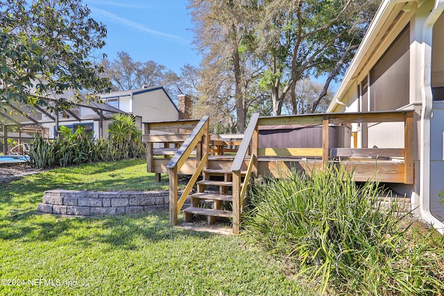 view of yard featuring a wooden deck