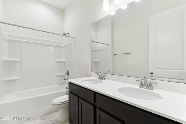 full bathroom with shower / tub combination, vanity, and toilet