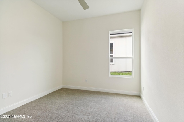 unfurnished room with carpet floors and ceiling fan