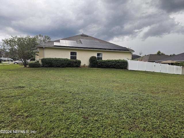 1075 Wetland Ridge Cir, Middleburg, FL 32068 - view of side of property with fence and a yard
