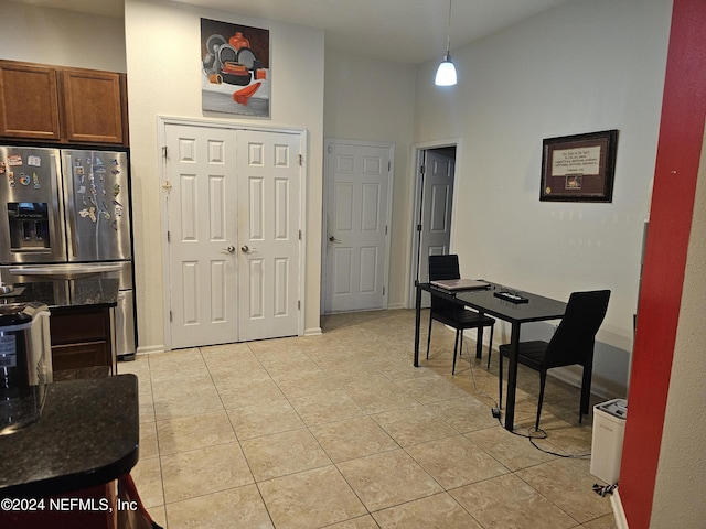 1075 Wetland Ridge Cir, Middleburg, FL 32068 - interior space with baseboards, a high ceiling, and light tile patterned floors