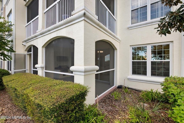 doorway to property featuring a balcony