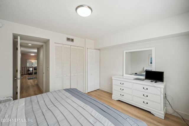 bedroom featuring light wood-type flooring