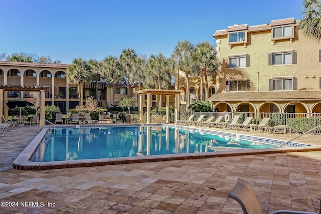 view of pool featuring a patio