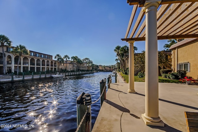 view of dock with a water view