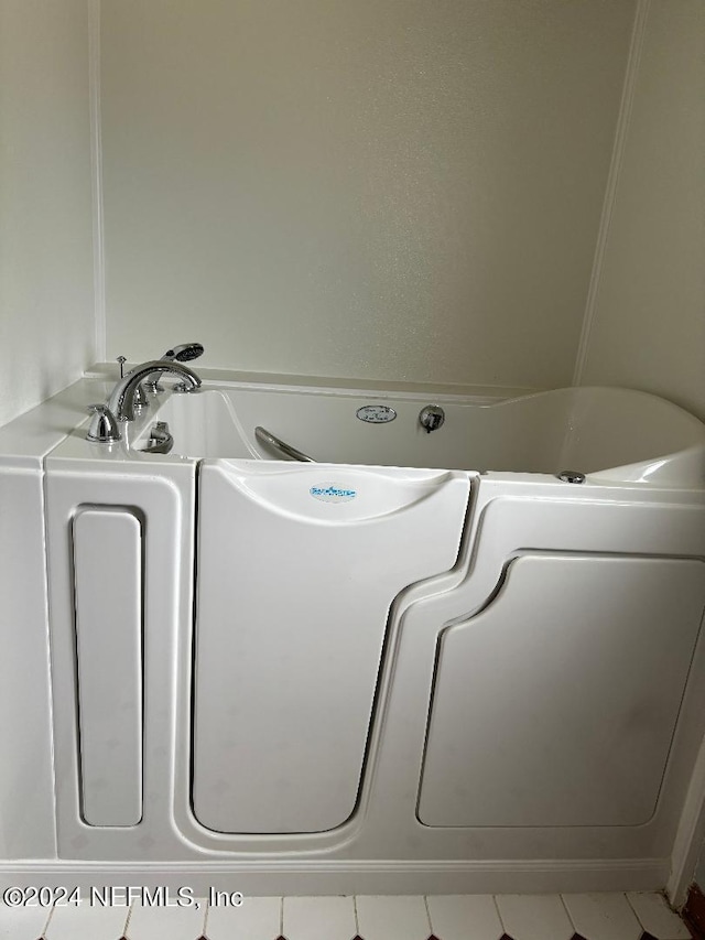 laundry room with tile patterned flooring