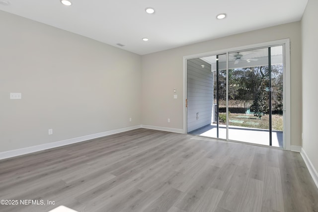 empty room featuring light hardwood / wood-style floors