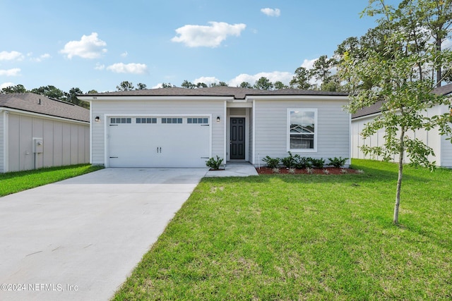 ranch-style home with a front yard and a garage