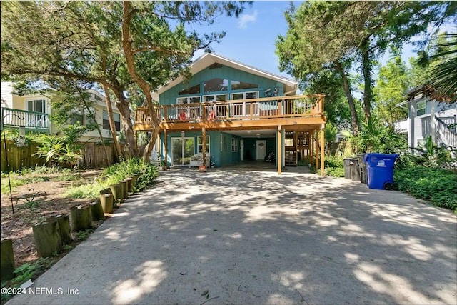 view of front facade with a carport