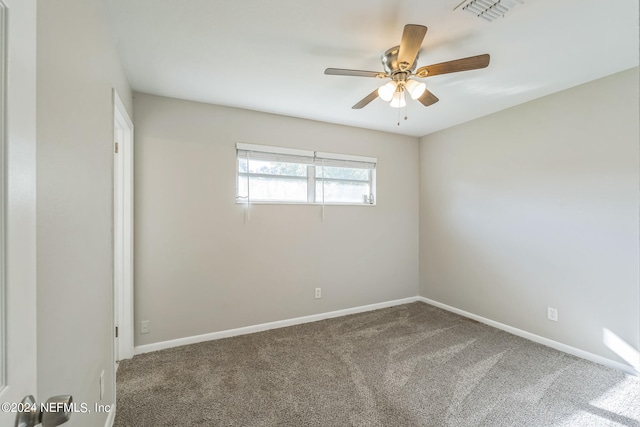 carpeted empty room with ceiling fan