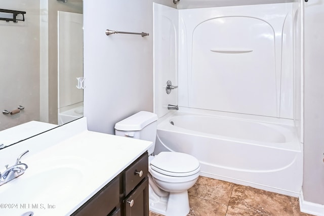 full bathroom featuring vanity, bathtub / shower combination, toilet, and tile patterned floors