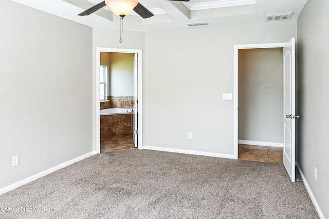 unfurnished bedroom featuring connected bathroom, carpet, and ceiling fan