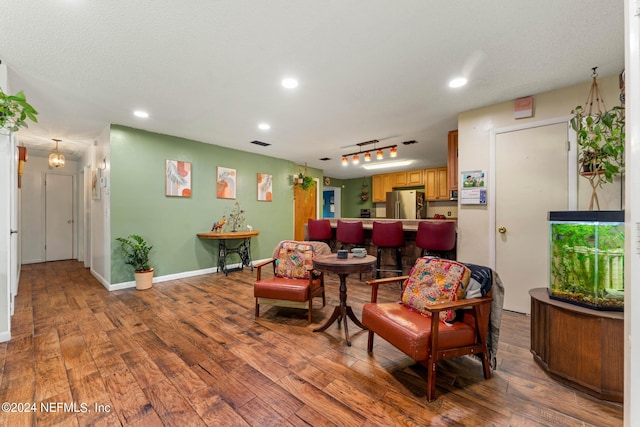 living room with hardwood / wood-style flooring