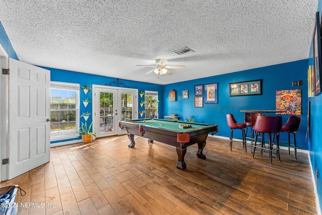 rec room featuring french doors, billiards, ceiling fan, and hardwood / wood-style floors