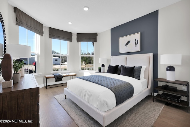 bedroom with light hardwood / wood-style floors