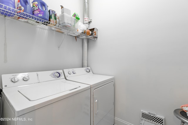 laundry room featuring independent washer and dryer