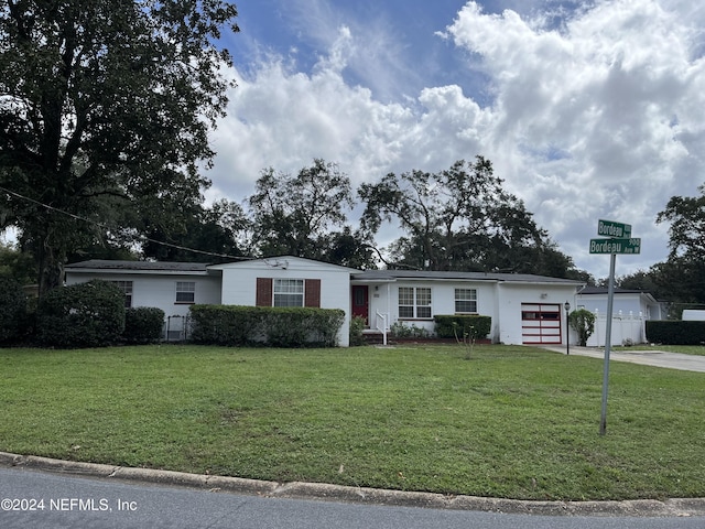 929 Bordeau Ave W, Jacksonville, FL 32211 - single story home with a garage, a front yard, and driveway