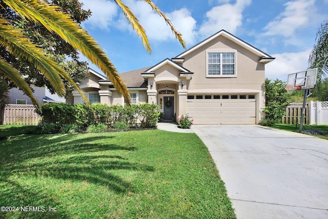 front facade featuring a garage and a front yard