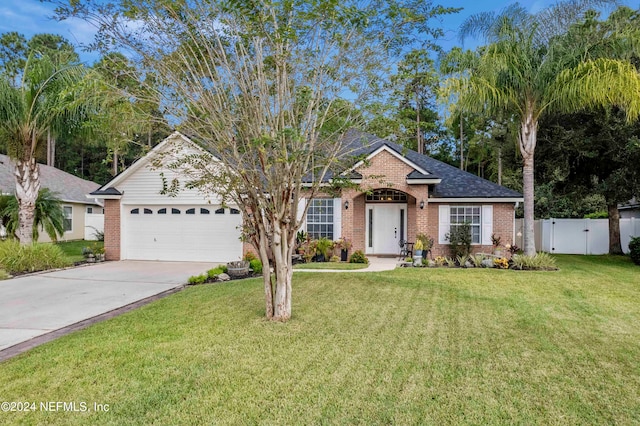 ranch-style house with a front yard and a garage