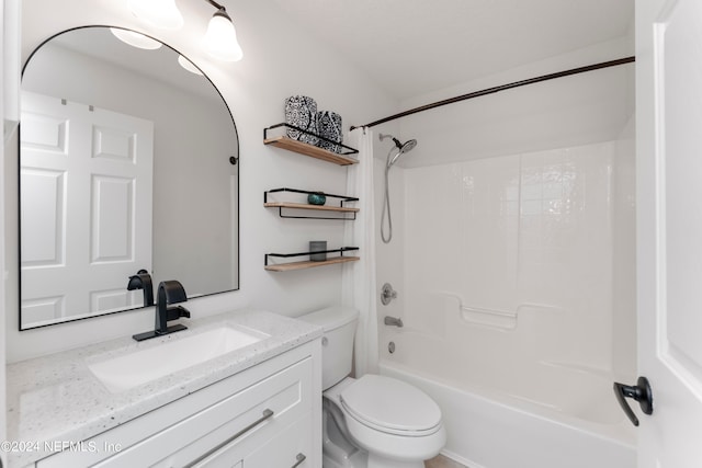 full bathroom featuring toilet, shower / bathing tub combination, and vanity