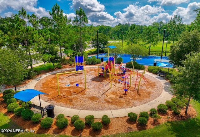 surrounding community featuring a playground