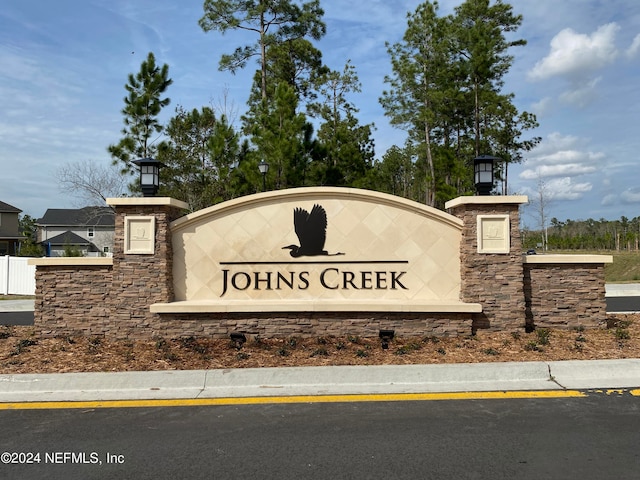 view of community sign