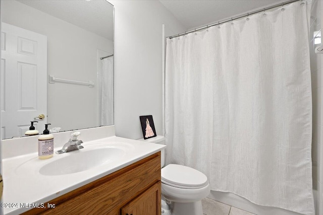 bathroom featuring tile patterned floors, vanity, toilet, and a shower with shower curtain