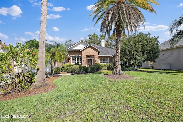 view of front facade with a front yard