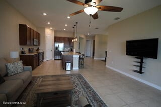 living room with ceiling fan