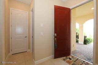 view of tiled foyer entrance