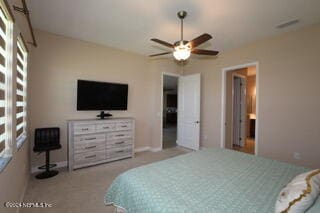 carpeted bedroom featuring ceiling fan