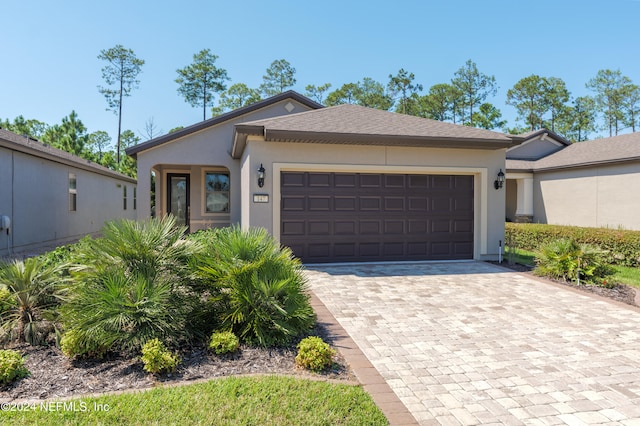 view of front of house with a garage