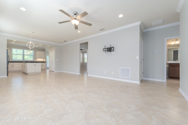 unfurnished living room with ornamental molding, ceiling fan, and light tile patterned floors