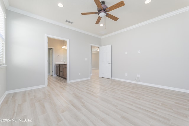 unfurnished bedroom featuring light hardwood / wood-style floors, ensuite bathroom, and ceiling fan