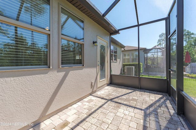 unfurnished sunroom with a healthy amount of sunlight