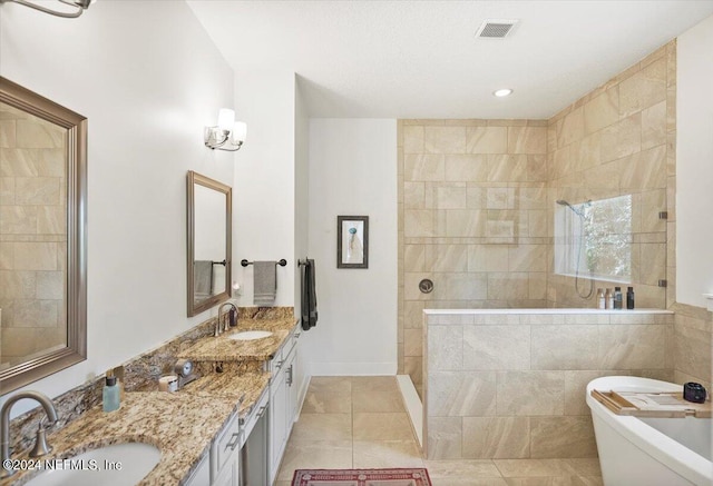 bathroom with vanity, separate shower and tub, and tile patterned flooring