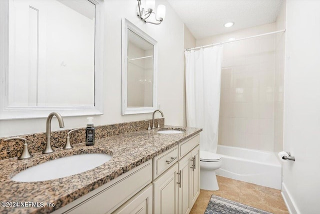 full bathroom featuring vanity, toilet, tile patterned floors, and shower / bath combo with shower curtain