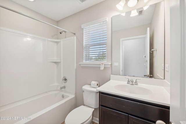 full bathroom with shower / washtub combination, vanity, and toilet