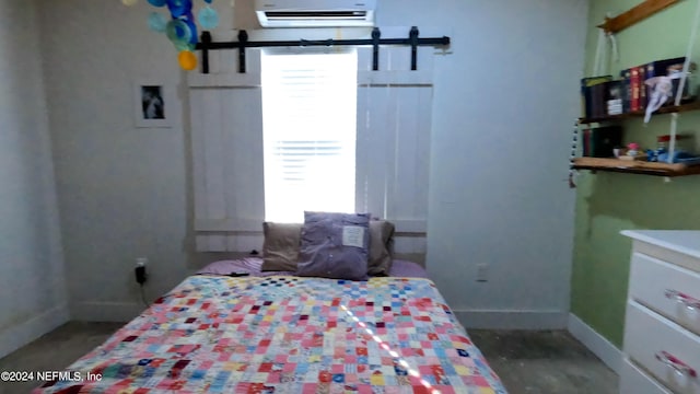 bedroom with a wall unit AC