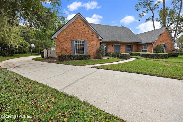 view of front of house with a front yard