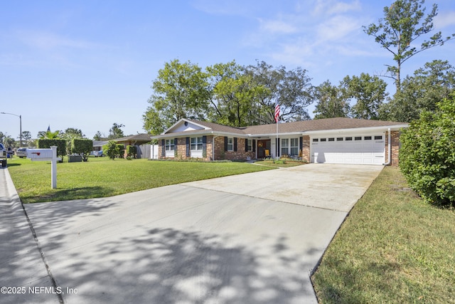 ranch-style house featuring a garage and a front yard