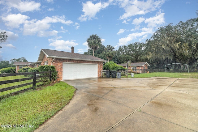 view of home's exterior featuring a lawn and a garage