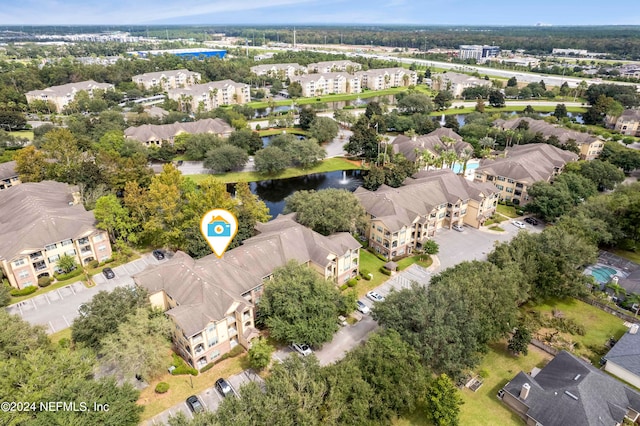 drone / aerial view featuring a water view