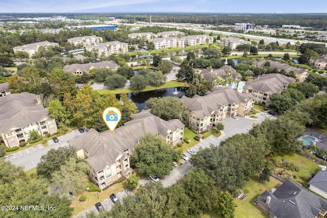 aerial view featuring a water view