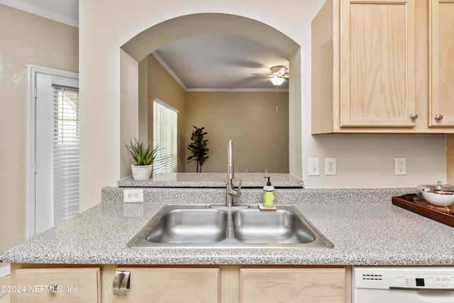 kitchen with arched walkways, dishwasher, ornamental molding, and a sink