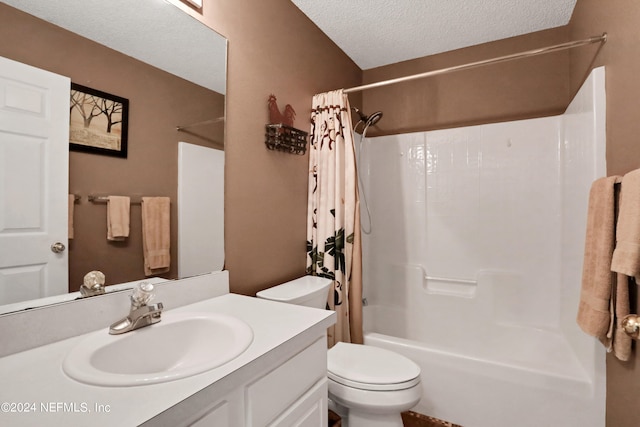 full bathroom with shower / bath combination with curtain, a textured ceiling, vanity, and toilet