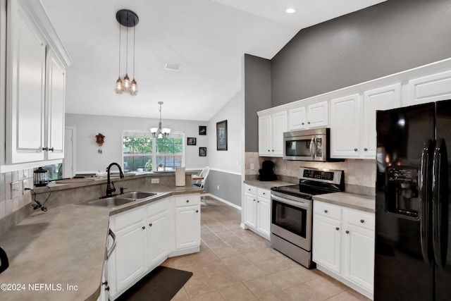 kitchen featuring pendant lighting, white cabinetry, appliances with stainless steel finishes, and sink