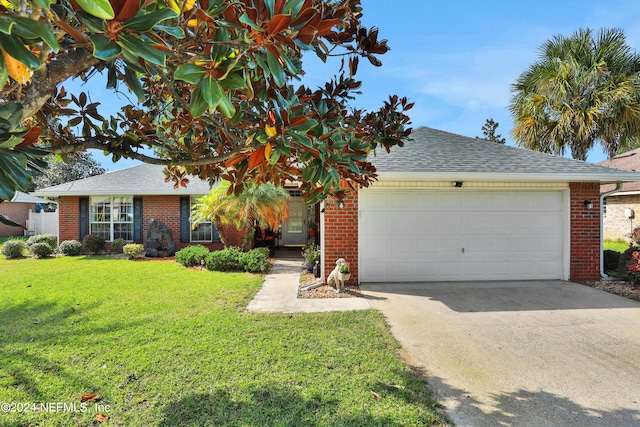 view of front facade featuring a front lawn and a garage