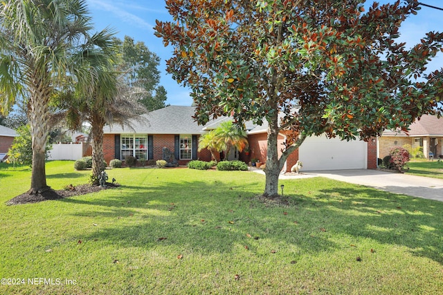 ranch-style home featuring a front yard