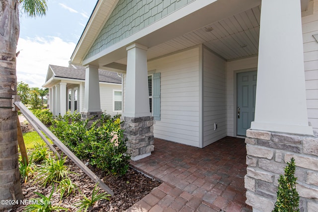 entrance to property with covered porch